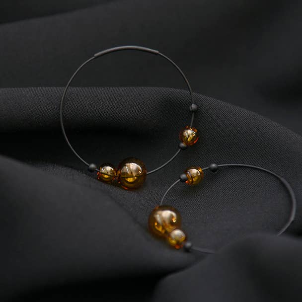 Earrings, Eclipse Hoops, Black Zinc & Amber Glass